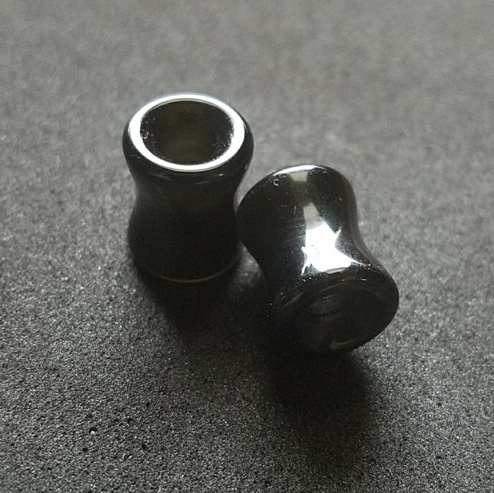 New 0g acrylic plugs gauges